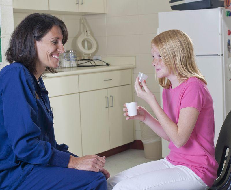 Student talking with nurse